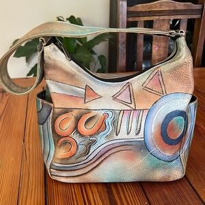 Anuschka authenticated purse handpainted, one shoulder strap